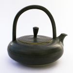 This stoneware teapot serves 5 cups. Limited stock, also comes in other colours by order. Teapot--black with overhead handle